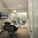 A dental chair in an exam room