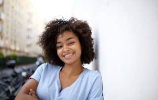 Young women showing off her smile