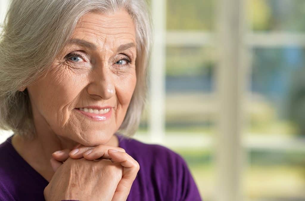 Elderly woman showing off her smile