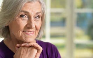 Elderly woman showing off her smile