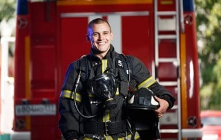 emergency firefighter shows off his smile